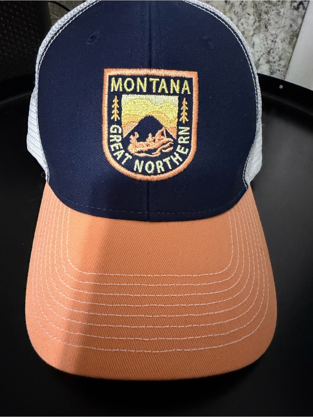 Oura Navy and Peach Montana Great Northern Patch Trucker Hat